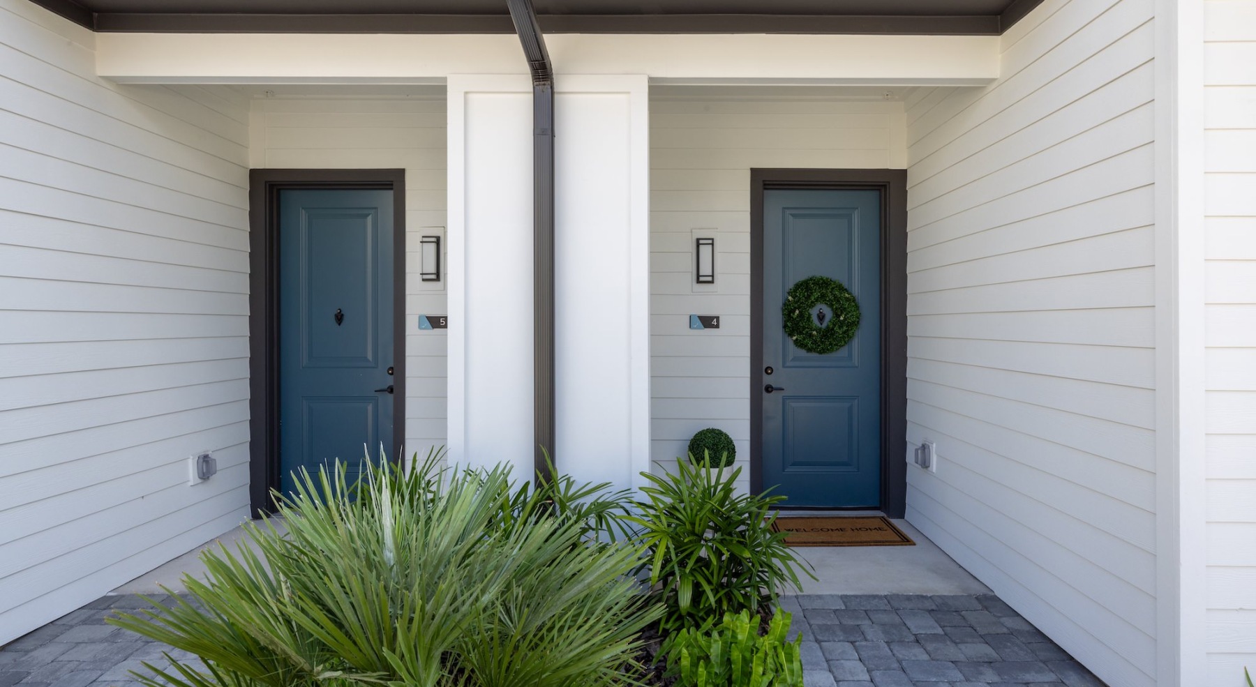 front doors with plants