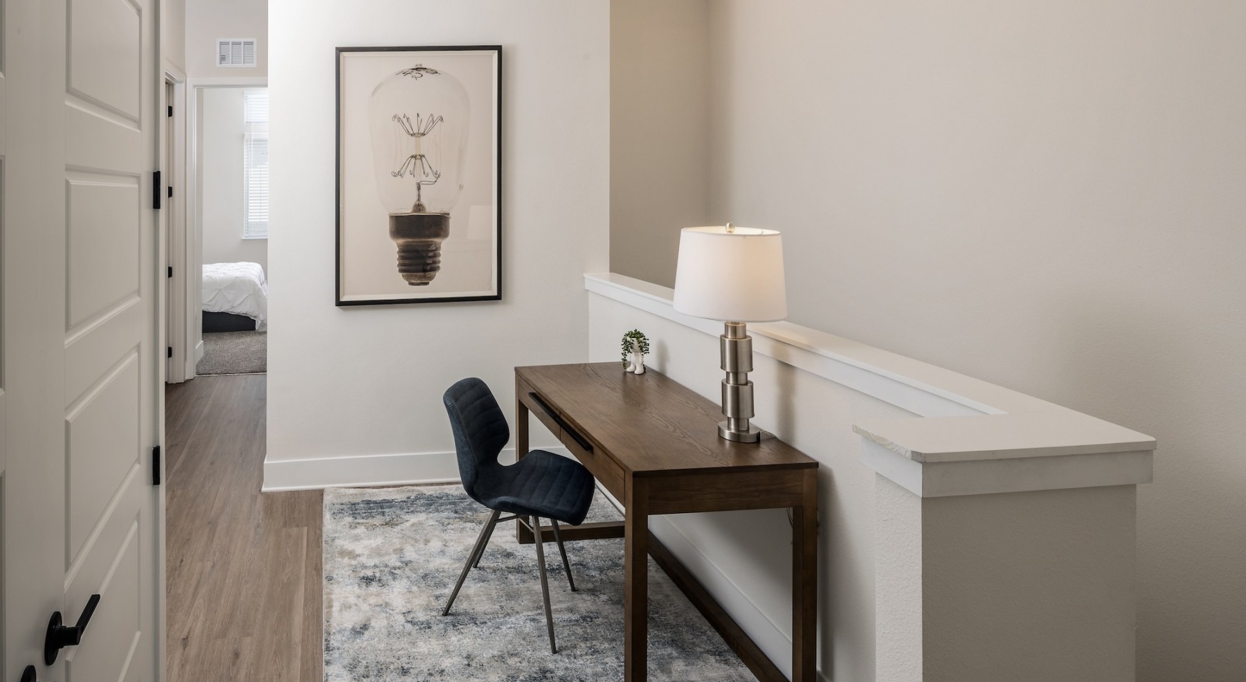 loft area with desk