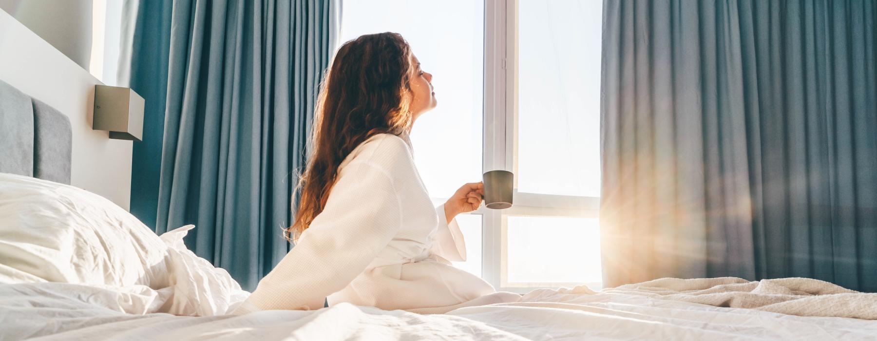 a person sitting on a bed